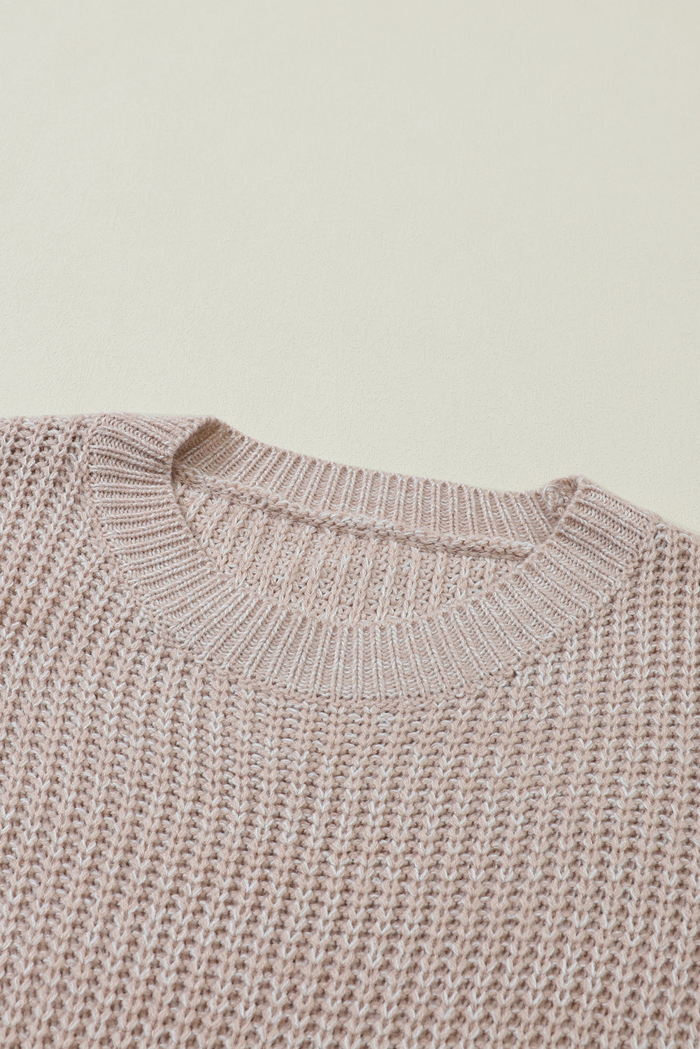 Tan textured knit sweater with crew neck and ribbed details