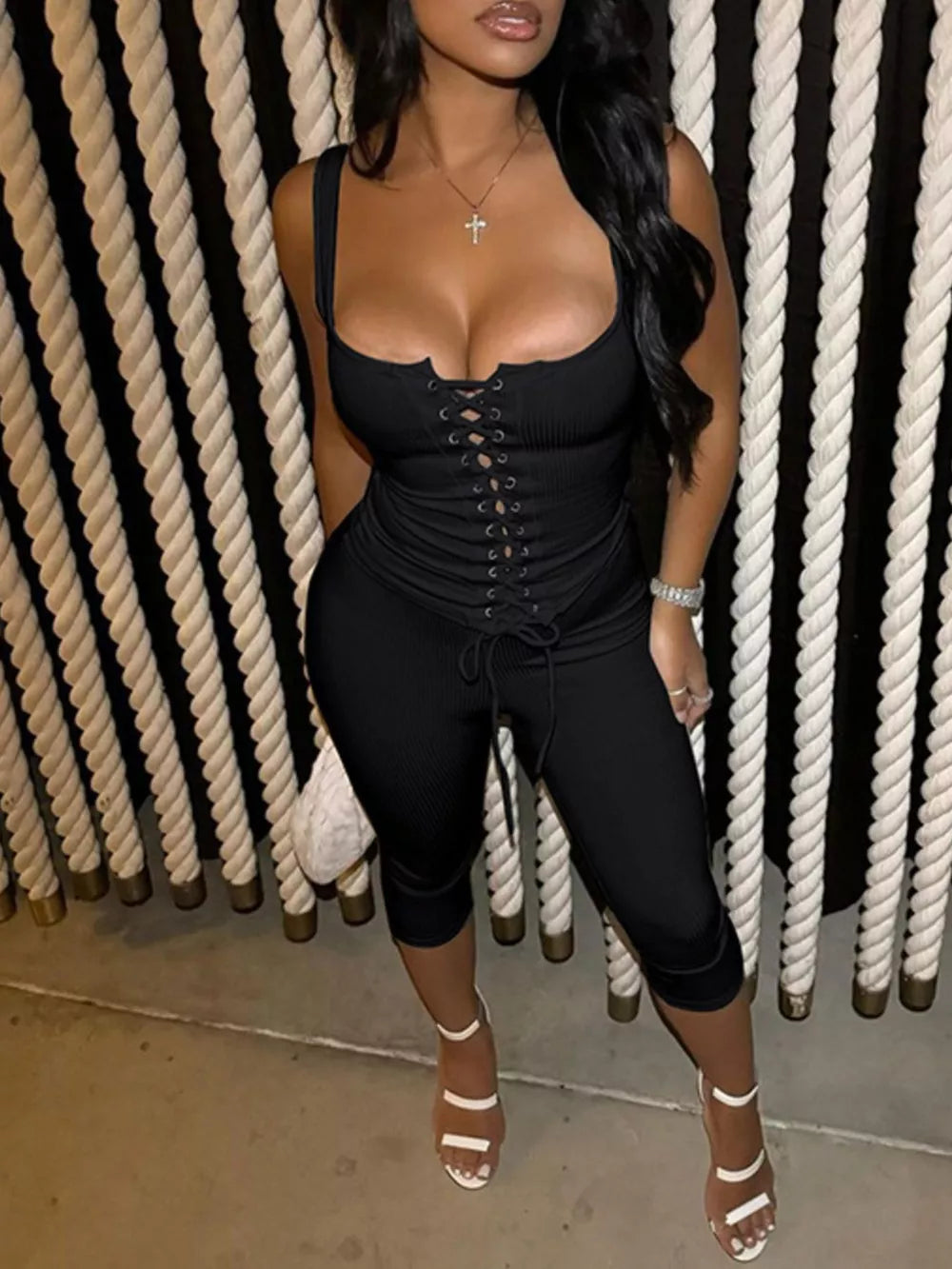 Black ribbed lace-up tank top and capri pants set with a scoop neckline.