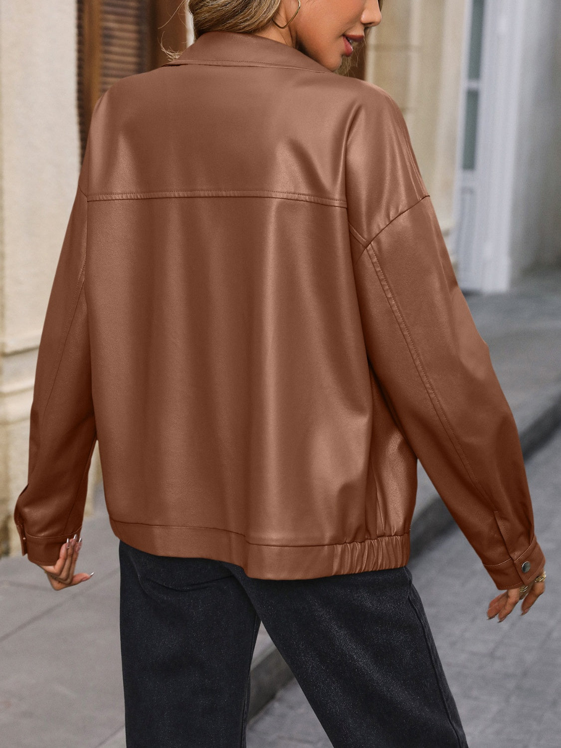 Brown faux leather bomber jacket with elastic cuffs and hem