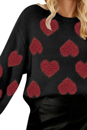 Black heart motif balloon sleeve knit sweater with crew neck.