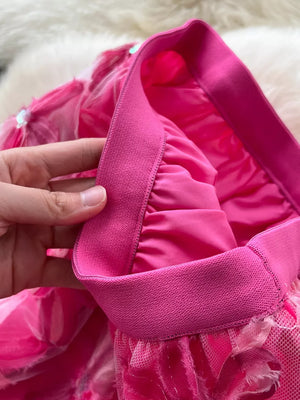 Pink layered skirt with floral embroidery and elastic waistband detail