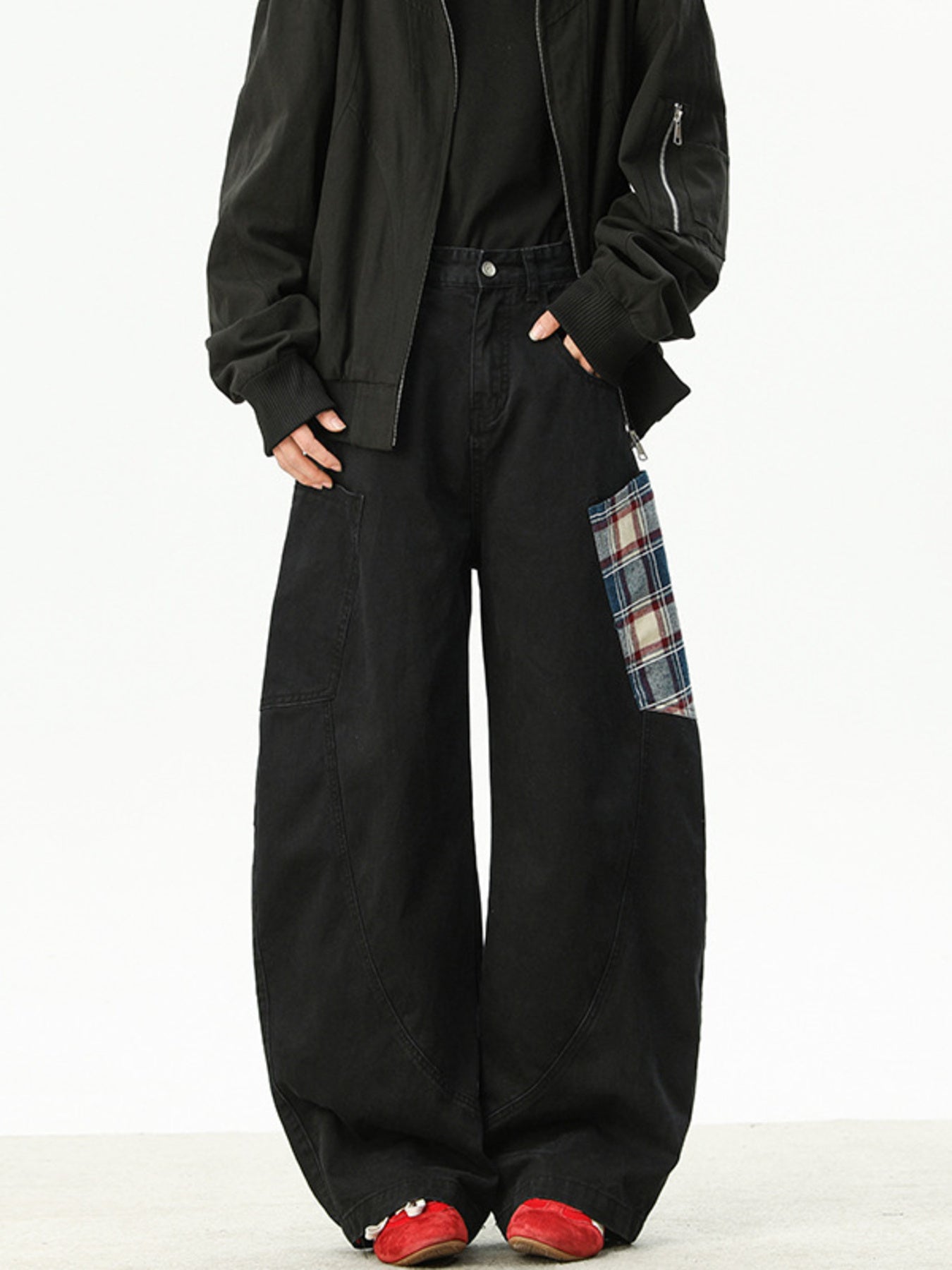 Men's black wide leg sweatpants with plaid pocket detail