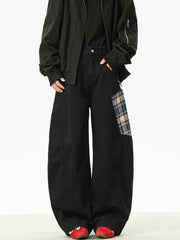 Men's black wide leg sweatpants with plaid pocket detail