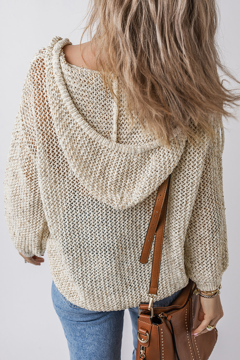 Beige open-knit hoodie pullover with V-neck and relaxed fit.