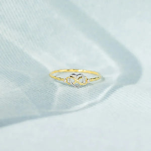 Gold intertwined heart and infinity ring with small accent stones.