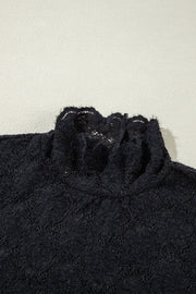 Black floral lace turtleneck blouse with ruffled neckline detail.