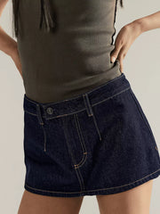 Dark blue denim mini skort with button closure and contrast stitching.