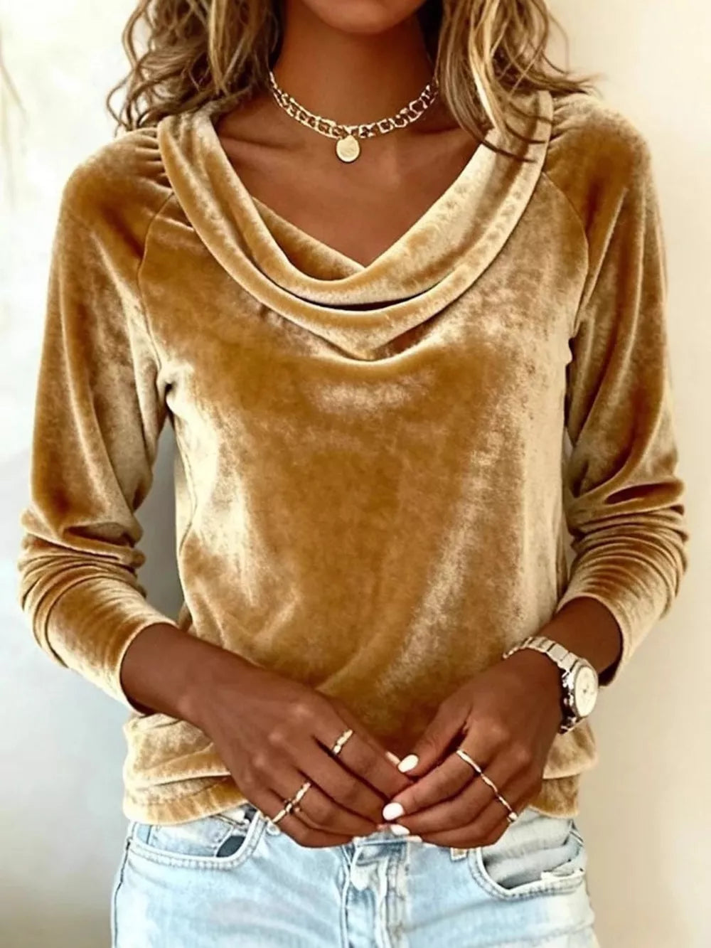 Gold velvet cowl neck t-shirt with long sleeves.