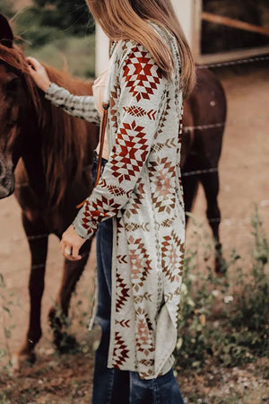 Southwestern print duster cardigan in brown with geometric patterns, long sleeves, and open front.
