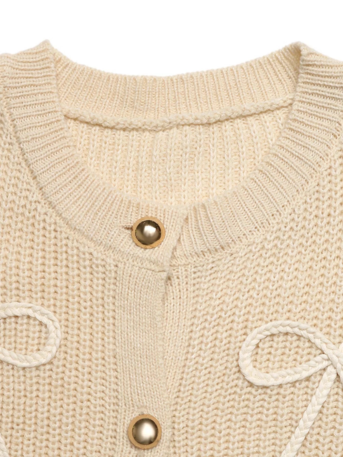 Ribbed knit cardigan in khaki with button-up front and braided bow details.