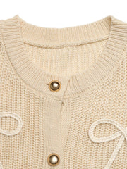 Ribbed knit cardigan in khaki with button-up front and braided bow details.