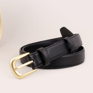 Black leather belt with a classic golden buckle