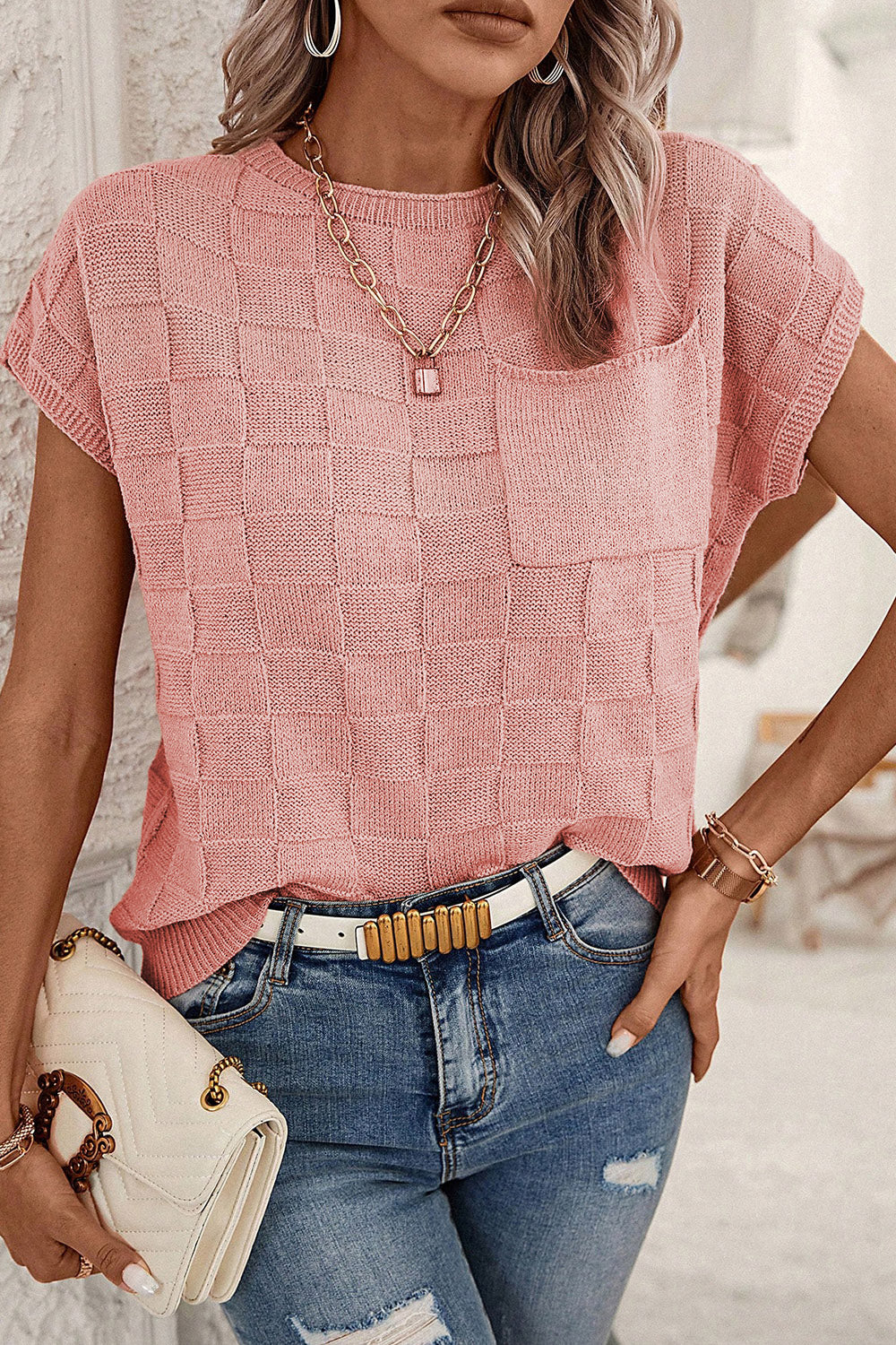 Dusty pink square-knit pocket tee with short sleeves and a crew neck.