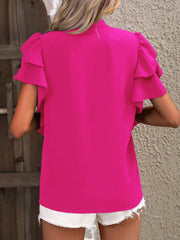 Hot pink blouse with ruffled short sleeves and a plunge neckline.