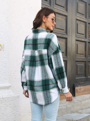 Oversized green plaid shacket with gold buttons, long sleeves, and collar.