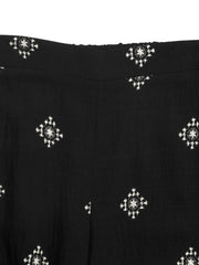 Black sleeveless top and pants set with white geometric print.