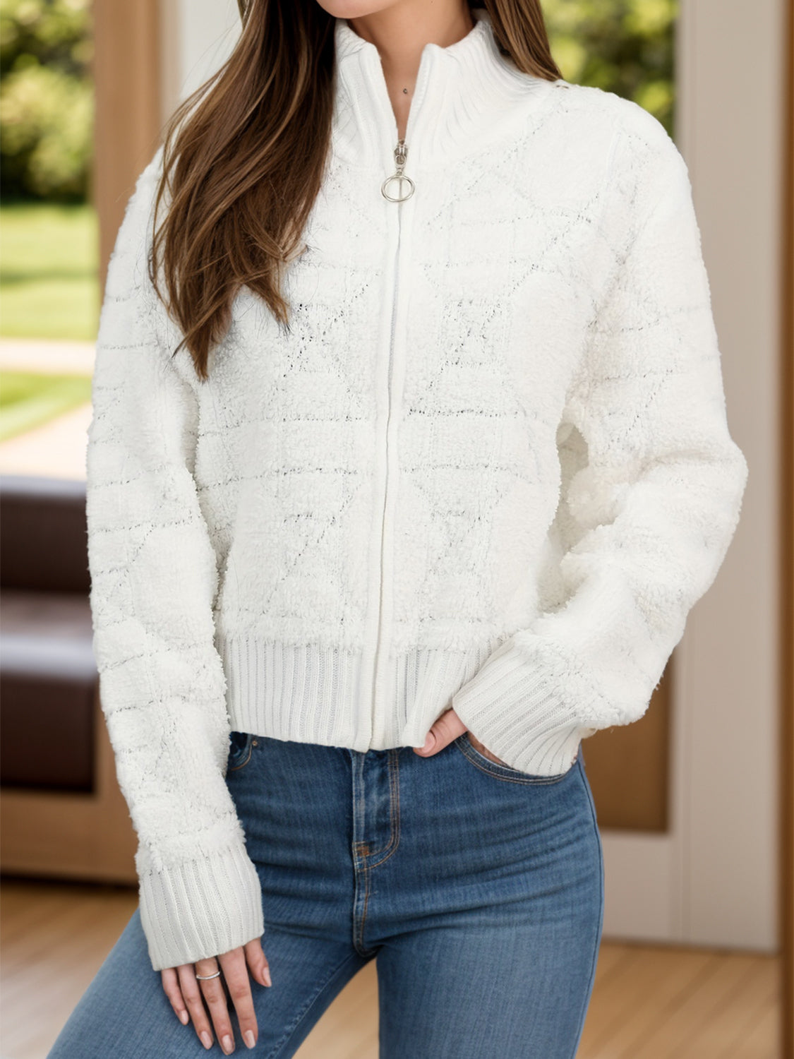 White textured knit bomber jacket with zip-up front and mock neck.