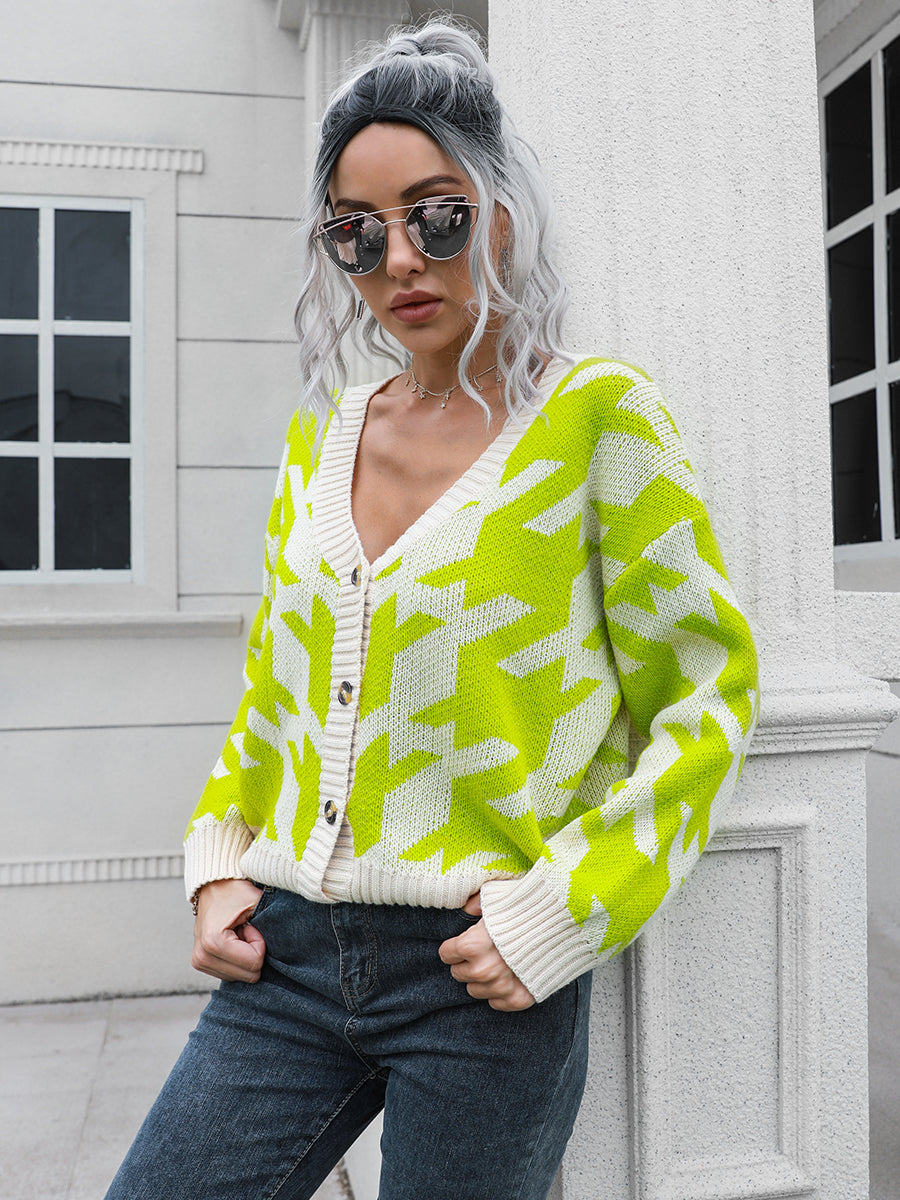 Geometric houndstooth V-neck cardigan in lime and cream acrylic with button front.