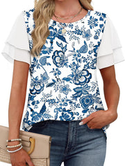 Blue floral print t-shirt with white layered ruffled short sleeves and a crew neck.