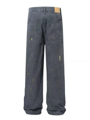 Loose fit sweatpants in grey with ink-splash detail and back pockets.