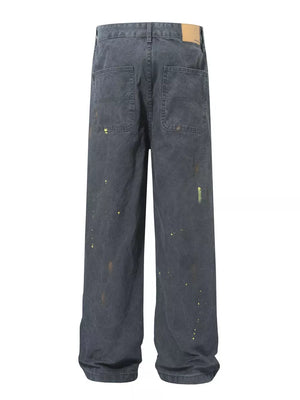 Loose fit sweatpants in grey with ink-splash detail and back pockets.