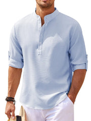Light blue textured henley shirt with roll-up sleeves and button detail