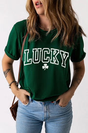 Dark green graphic tee with white LUCKY text and shamrock, rolled sleeves