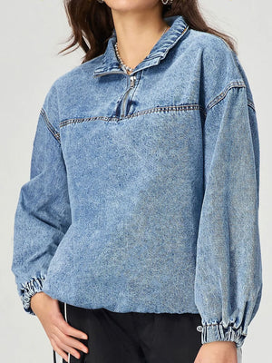 Acid wash denim pullover sweatshirt with quarter zip and elastic cuffs