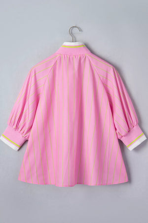 Pink striped casual shirt with white and lime green collar and cuffs.