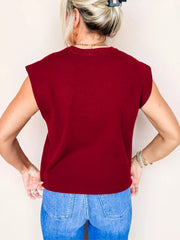 Burgundy crew neck cap sleeve sweater with a casual fit.