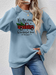 Misty Blue sweatshirt with a graphic print of a red plaid truck carrying Christmas trees and text.