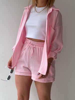 Textured gauze shirt and short co-ord set in blush pink, casual button-up style.