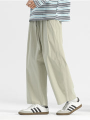 Men's sage wide-leg drawstring casual trousers with a relaxed fit.
