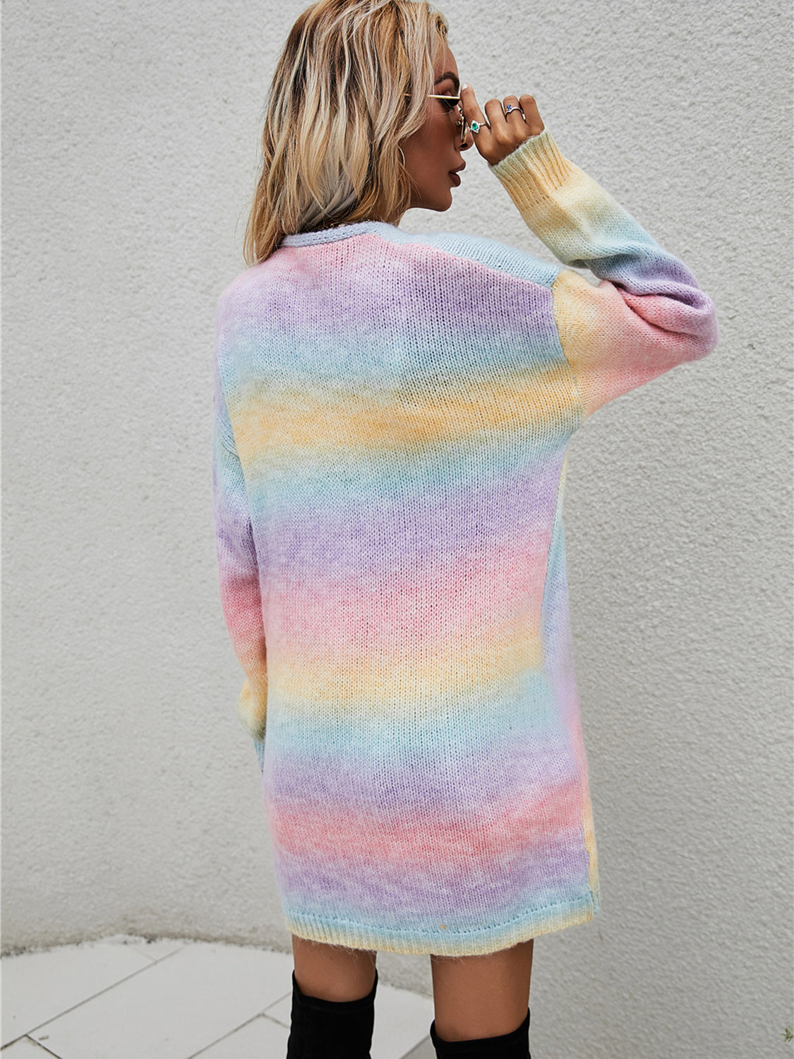 Rainbow gradient knit cardigan with long sleeves and crew neck.