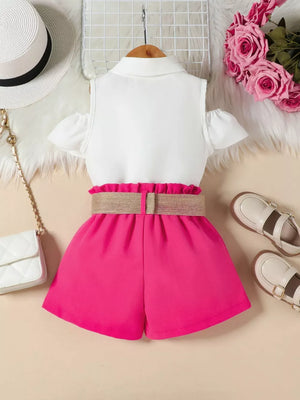 Toddler cold-shoulder ruffled set with white top and rose red belted shorts.