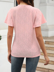 Blush pink eyelet blouse with flutter sleeves and V-neck, showing floral pattern detail.