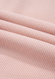 Blush pink waffle knit fabric detail