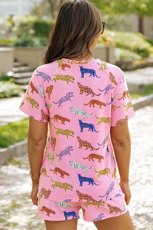 Pink leopard print loungewear set with short sleeves and shorts.