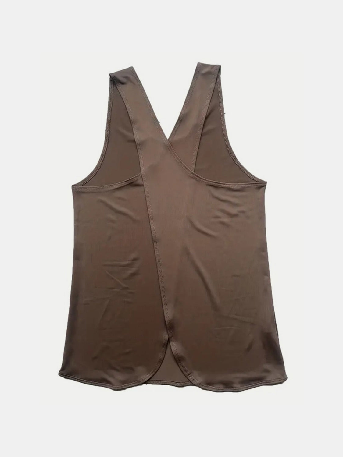 Mocha tank top with cross-back straps and a split hem