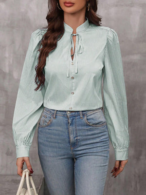 Light green striped blouse with puffed sleeves and keyhole tie neck