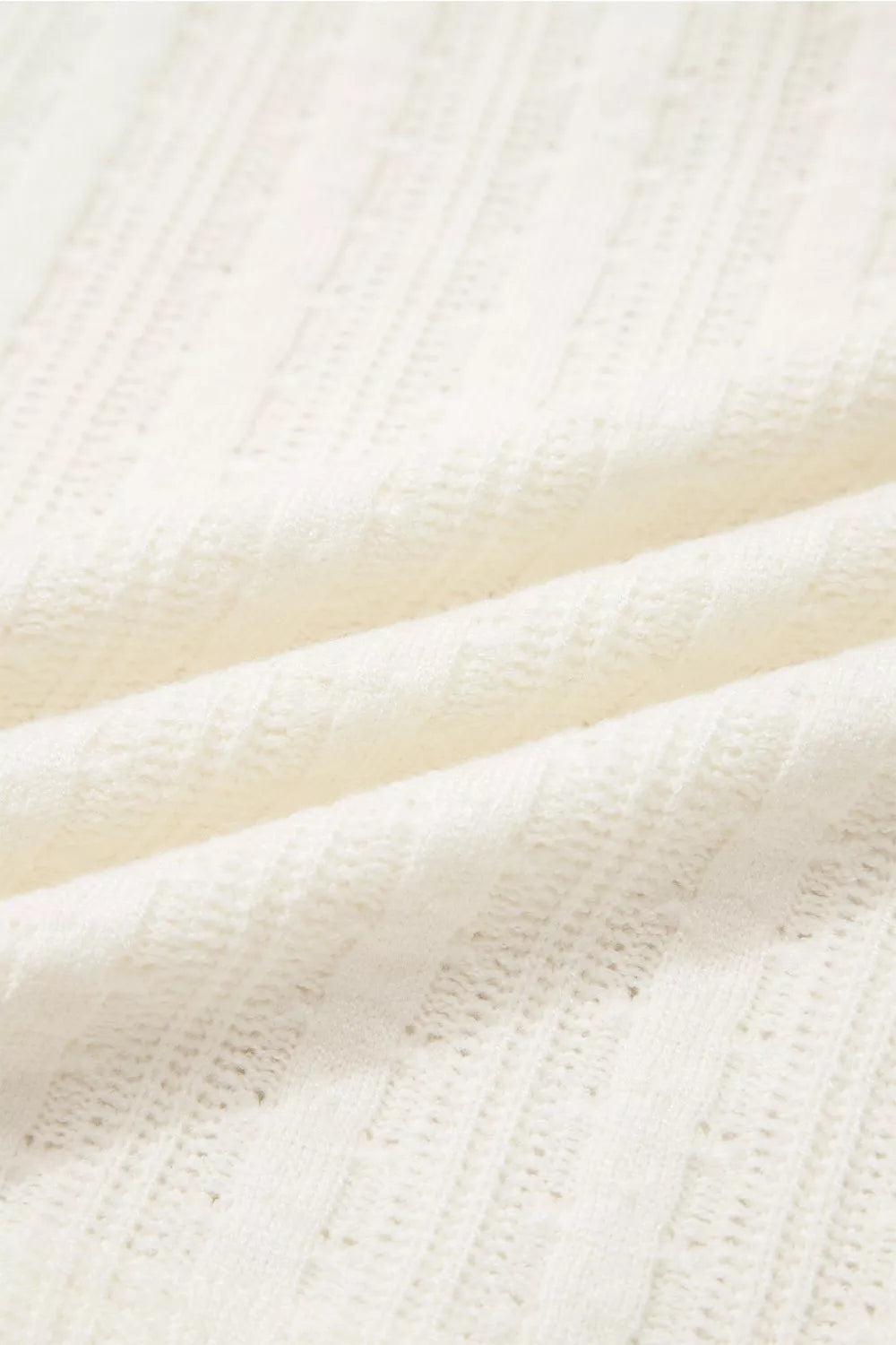 Textured cream V-neck maternity t-shirt with subtle button details