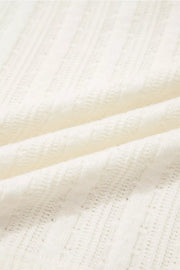 Textured cream V-neck maternity t-shirt with subtle button details