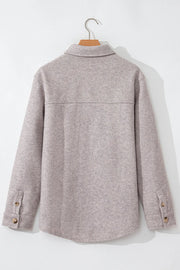 Fleece utility shirt jacket in Dust Storm with button cuffs and a yoke detail.