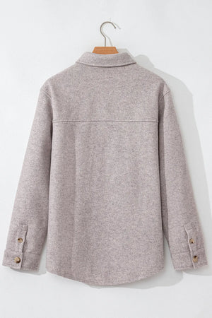 Fleece utility shirt jacket in Dust Storm with button cuffs and a yoke detail.