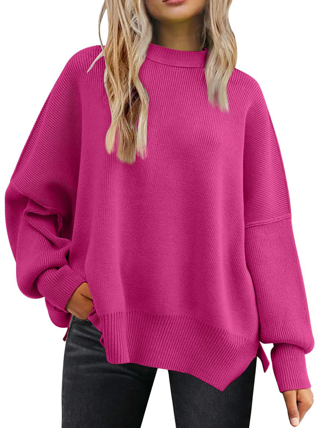 Ribbed-knit relaxed fit sweater in deep rose with mock neckline and dolman sleeves.