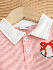 Pink baby dress with white collar, buttons, and embroidered baseball detail.