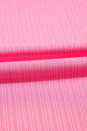 Pink ribbed knit skirt detail with a drawstring waist