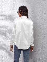 White satin collared button-down shirt with long sleeves, shown from the back.