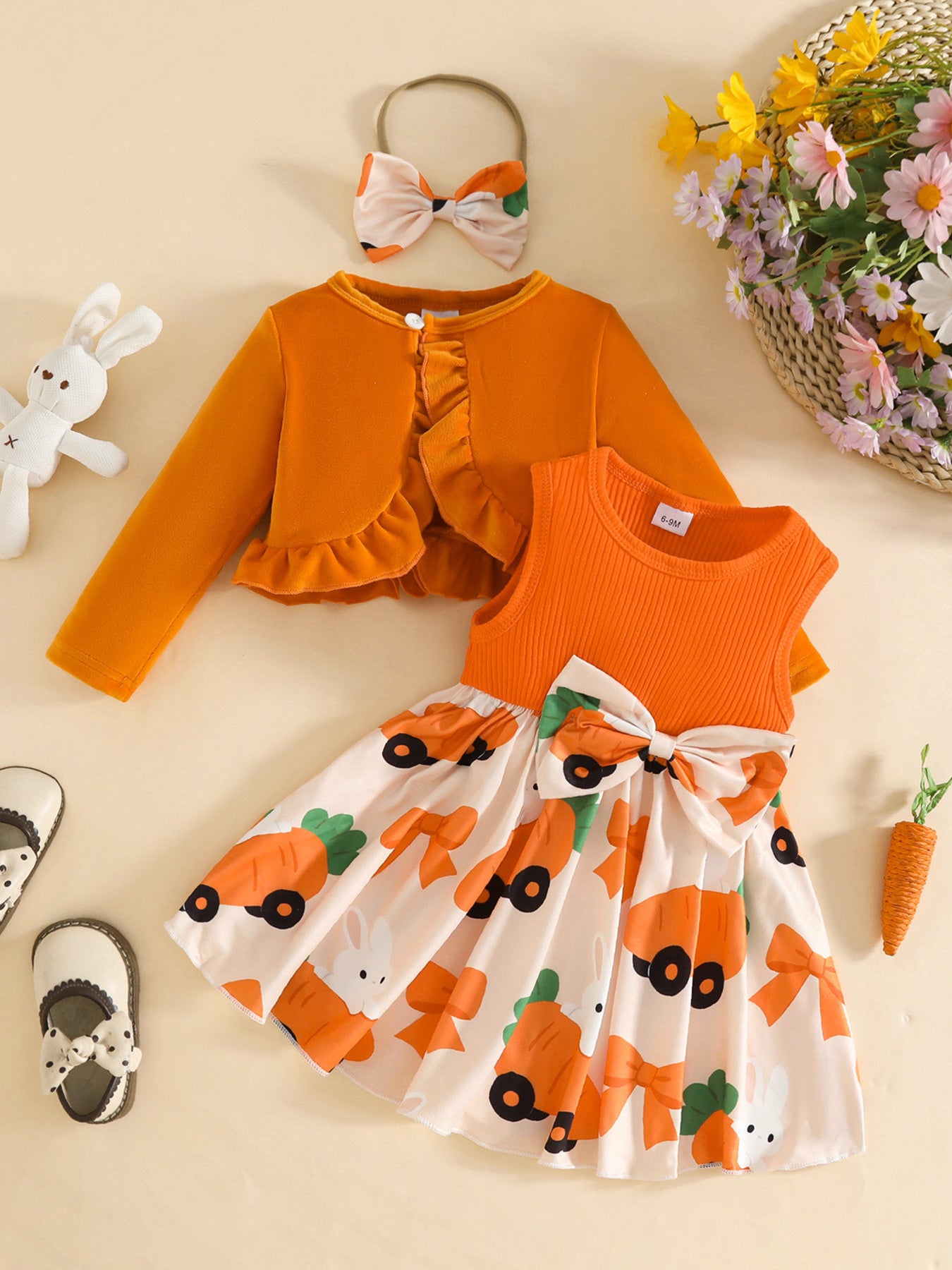 Orange baby set with ruffled cardigan and carrot and bunny print dress with bow detail