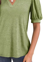 Matcha green t-shirt with puff sleeves and notched V-neck.